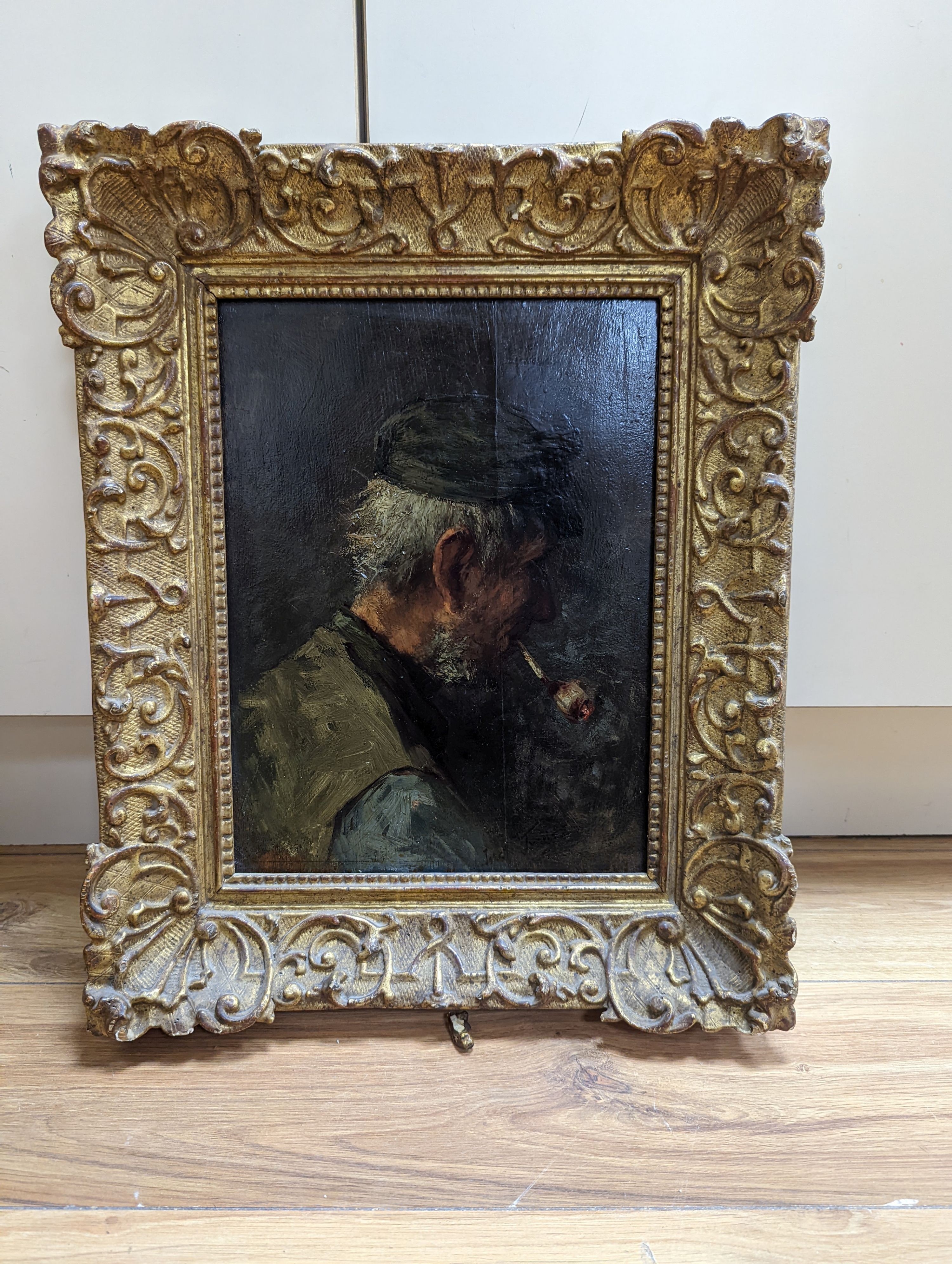 Joseph Israels (1824-1911), oil on wooden panel, Portrait of a pipe smoker, signed, 33 x 25cm